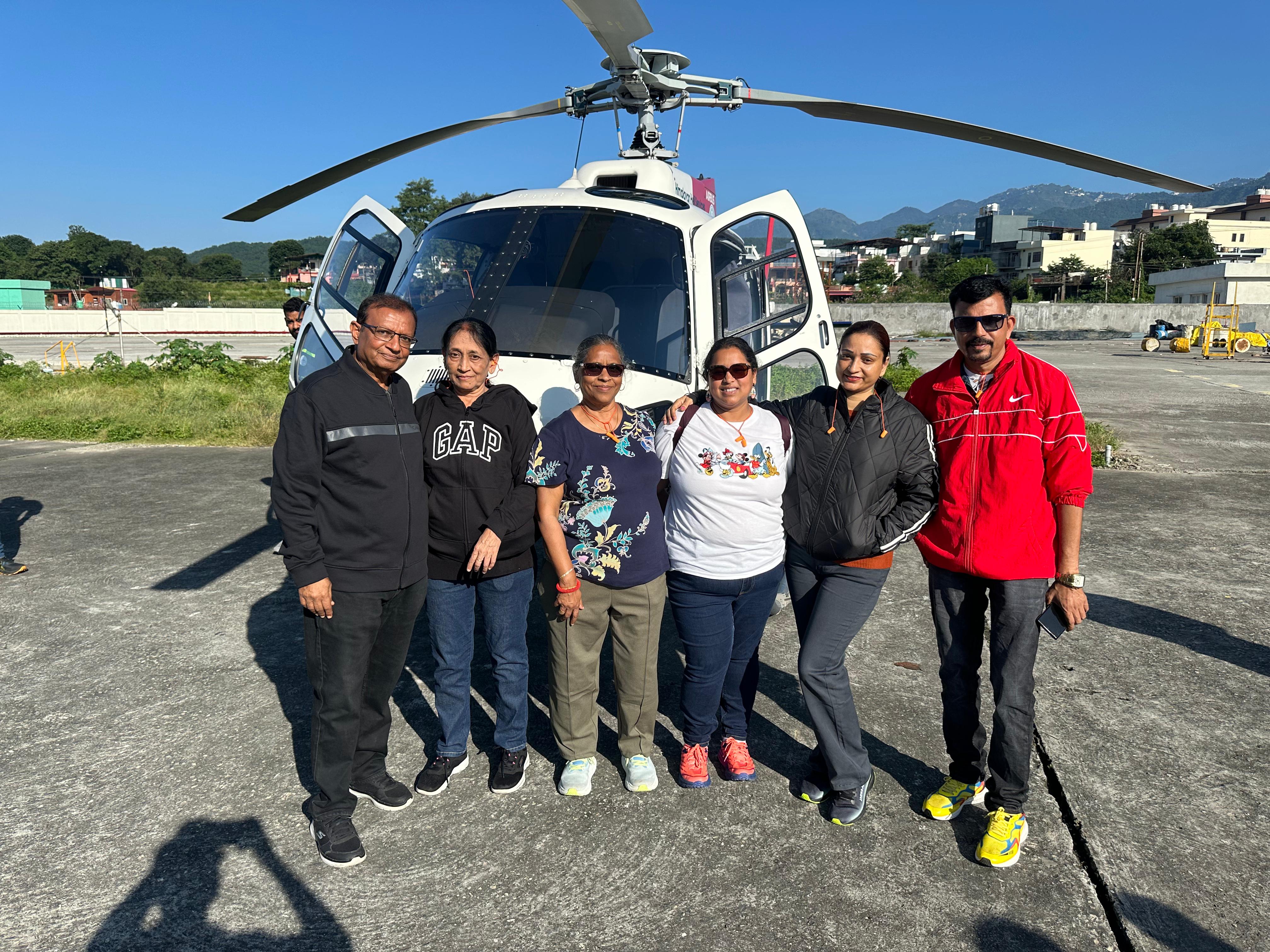 Pilgrims boarding helicopter for Chardham yatra